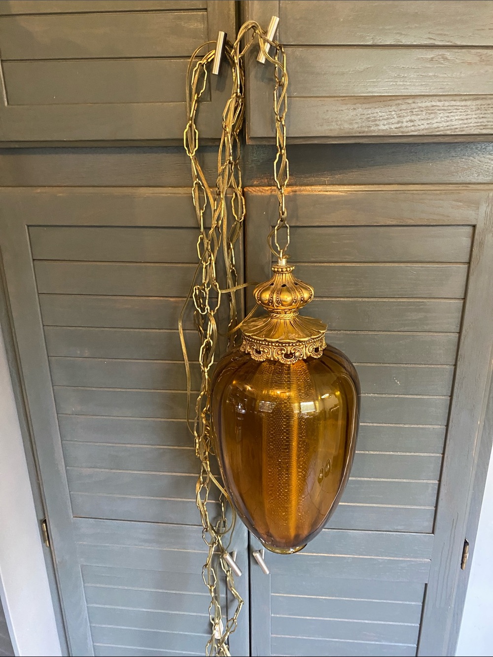 Vintage Mid-Century Modern amber glass swag lamp